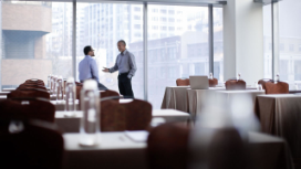 Business Men in Meeting Room